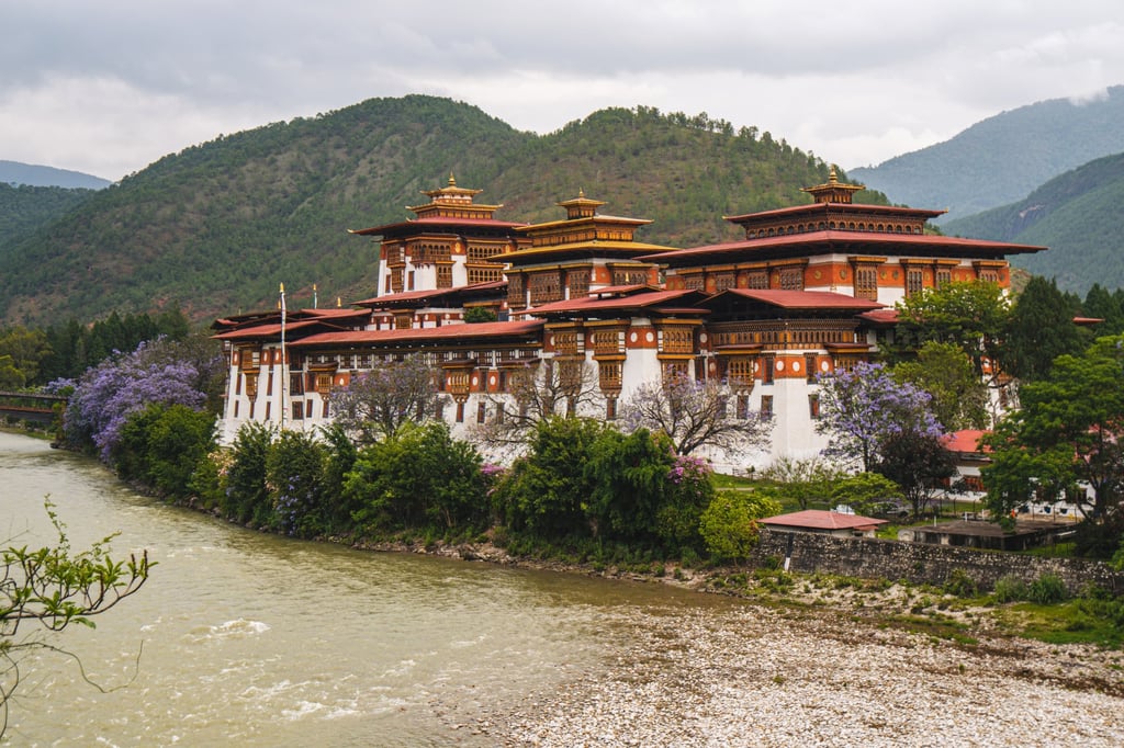 Punakha Dzong sits at the confluence of the Pho Chhu and Mo Chhu waterways, in Punakha district, Bhutan. Photo: Jen Paolini Punakha Dzong sits at the confluence of the Pho Chhu and Mo Chhu waterways, in Punakha district, Bhutan. Photo: Jen Paolini