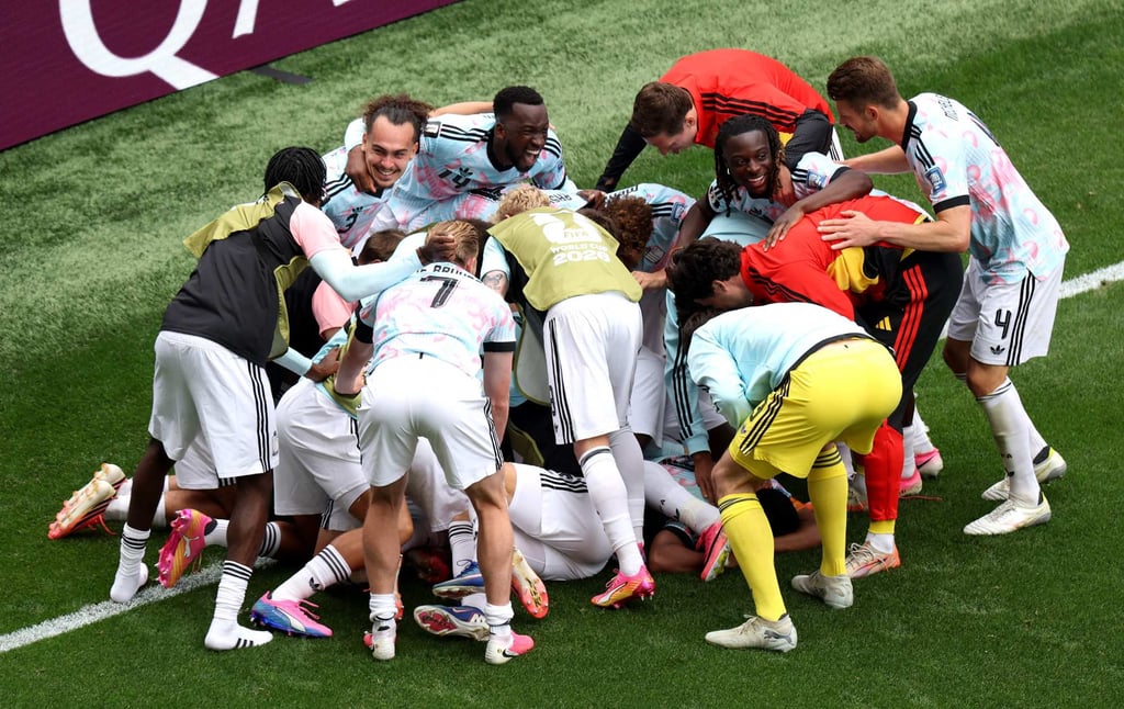 The Belgium team celebrate a remarkable ending to their game against Senegal. Photo: AFP The Belgium team celebrate a remarkable ending to their game against Senegal. Photo: AFP