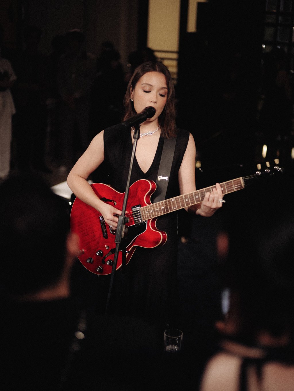 Laufey entertained with her signature blend of jazz and classical stylings, while wearing pieces from the Chanel Ruban collection. Photo: Handout Laufey entertained with her signature blend of jazz and classical stylings, while wearing pieces from the Chanel Ruban collection. Photo: Handout