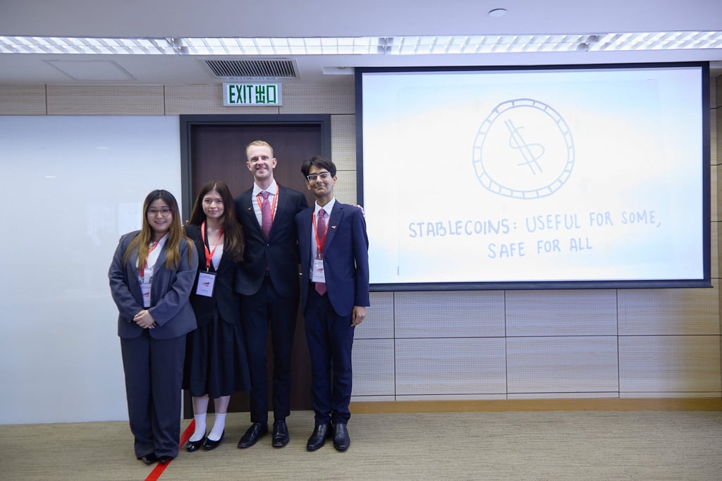 (From left) Students Yan Kei Woo, Rhea Patricia Kowara, Adam Sutherland Gear and Jeenendra Agarwal of the City University of Hong Kong’s team won the Hong Kong Round of the HSBC/HKU Business Case Challenge 2026. Photo: HSBC (From left) Students Yan Kei Woo, Rhea Patricia Kowara, Adam Sutherland Gear and Jeenendra Agarwal of the City University of Hong Kong’s team won the Hong Kong Round of the HSBC/HKU Business Case Challenge 2026. Photo: HSBC