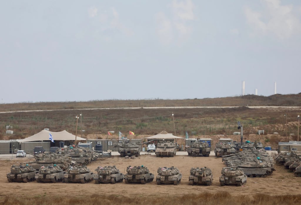 Israeli military vehicles are seen near Kibbutz Reim bordering Gaza in southern Israel, on Thursday. Photo: Xinhua Israeli military vehicles are seen near Kibbutz Reim bordering Gaza in southern Israel, on Thursday. Photo: Xinhua