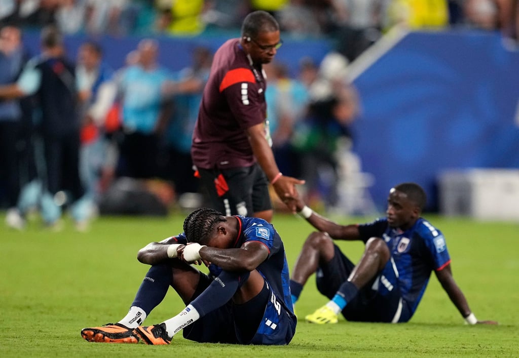 Cabo Verde pair Sidny Lopes Cabral and Jamiro Monteiro sit on the pitch after a breathtaking game against Argentina. Photo: AP Cabo Verde pair Sidny Lopes Cabral and Jamiro Monteiro sit on the pitch after a breathtaking game against Argentina. Photo: AP