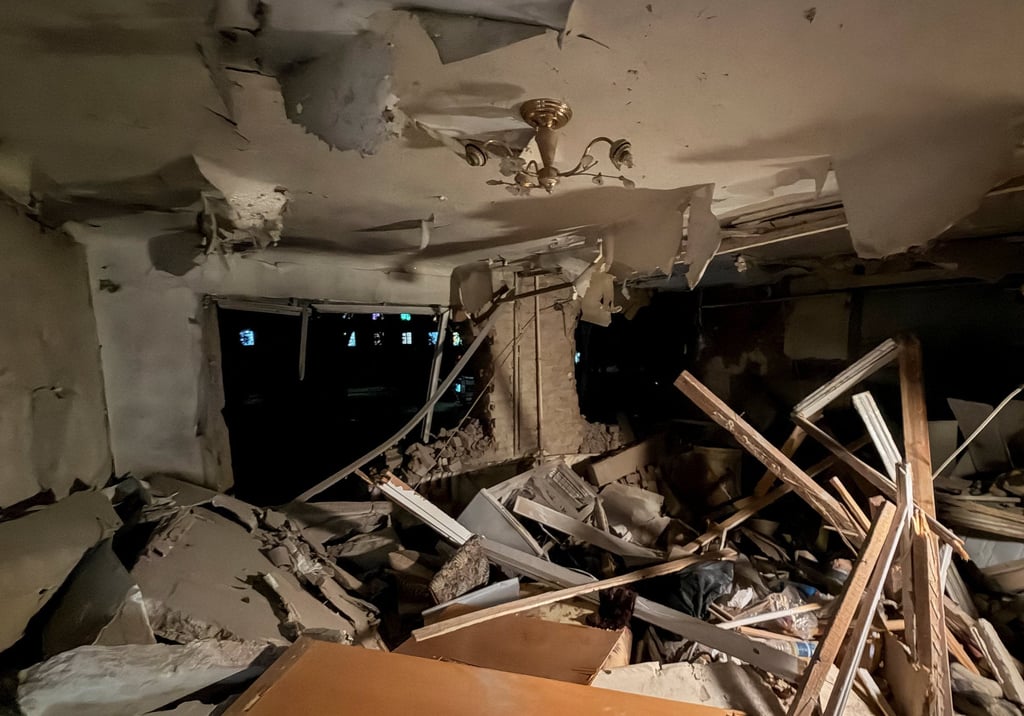 The interior of a damaged flat is seen in an apartment building hit by a Russian air strike on Friday. Photo: Reuters