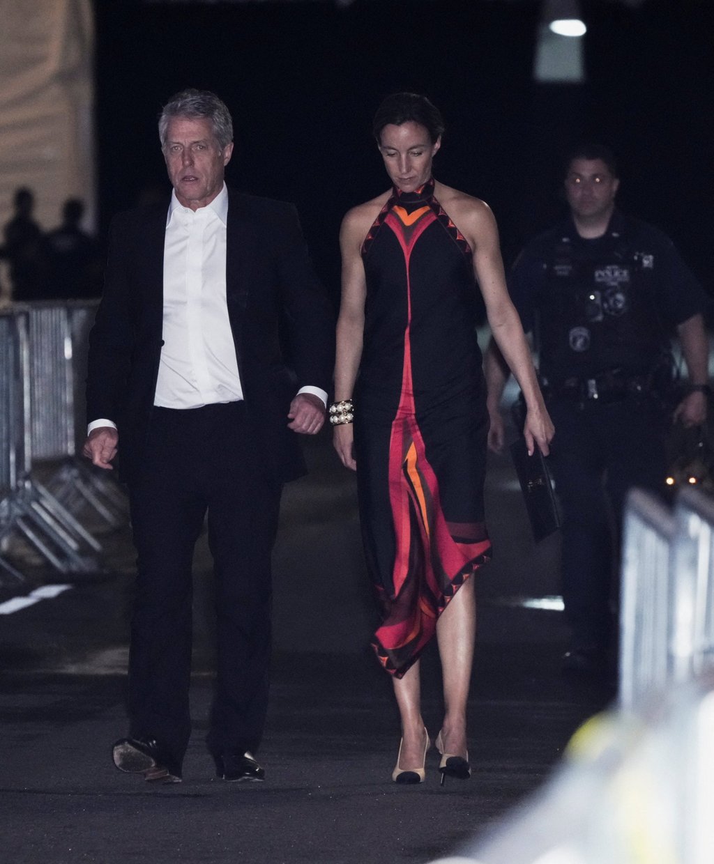 Hugh Grant and his wife, Anna Elisabet Eberstein, depart Madison Square Garden, the venue for the wedding celebrations of Taylor Swift and Travis Kelce, in New York on Friday. Photo: Reuters Hugh Grant and his wife, Anna Elisabet Eberstein, depart Madison Square Garden, the venue for the wedding celebrations of Taylor Swift and Travis Kelce, in New York on Friday. Photo: Reuters