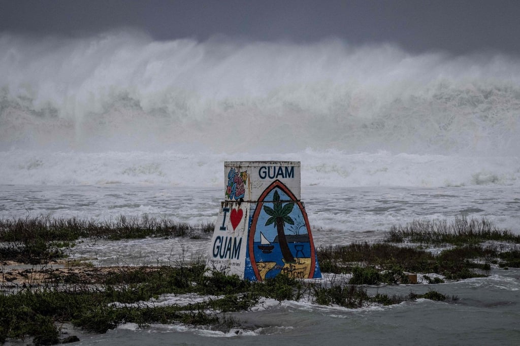 High waves crash against the coastline in Guam on Sunday. People were moving to emergency centres hours before a ‘super typhoon’ was projected to arrive. Photo: AFP High waves crash against the coastline in Guam on Sunday. People were moving to emergency centres hours before a ‘super typhoon’ was projected to arrive. Photo: AFP
