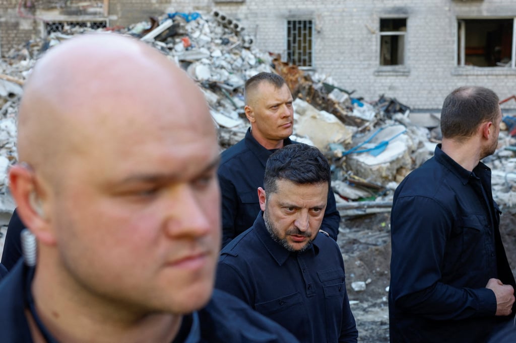 Ukraine’s President Volodymyr Zelensky speaks to the media as he visits the site of an apartment building damaged by Russian air strikes in Kyiv on Thursday. Photo: Reuters Ukraine’s President Volodymyr Zelensky speaks to the media as he visits the site of an apartment building damaged by Russian air strikes in Kyiv on Thursday. Photo: Reuters