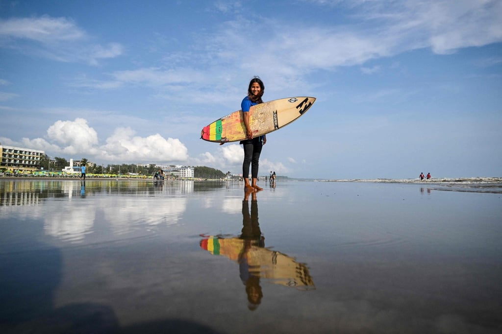 Bangladeshi surfer Fatima Akhter before a surfing session in Cox’s Bazar. Photo: AFP Bangladeshi surfer Fatima Akhter before a surfing session in Cox’s Bazar. Photo: AFP