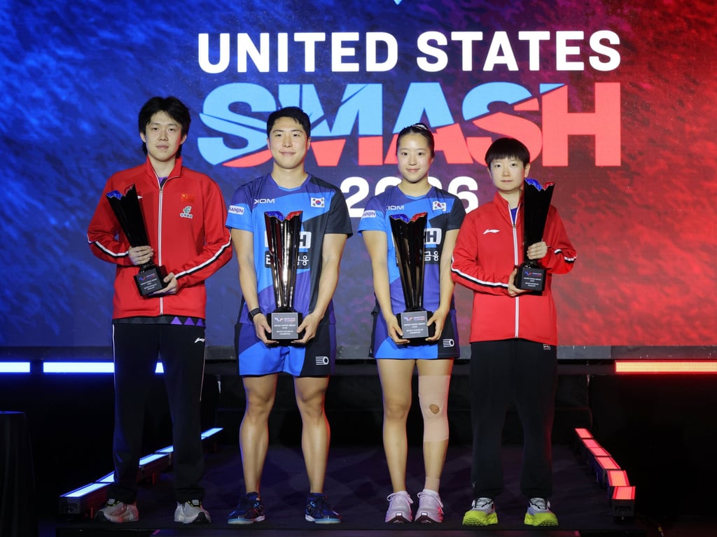 South Koreans Lim Jonghoon and Shin Yubin (centre) are flanked by Wang Chuqin (left) and Sun Yingsha after winning the mixed doubles. Photo: Xinhua South Koreans Lim Jonghoon and Shin Yubin (centre) are flanked by Wang Chuqin (left) and Sun Yingsha after winning the mixed doubles. Photo: Xinhua