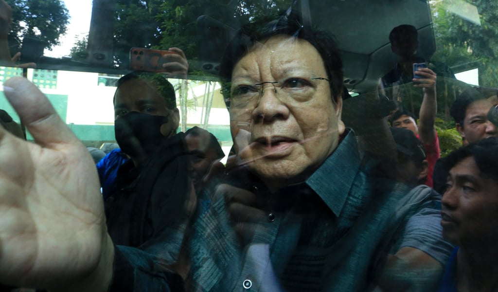 Philippine Senator Rodante Marcoleta gestures from the window of a police vehicle after being arrested for alleged plunder in Quezon City on Monday. Photo: AP Philippine Senator Rodante Marcoleta gestures from the window of a police vehicle after being arrested for alleged plunder in Quezon City on Monday. Photo: AP