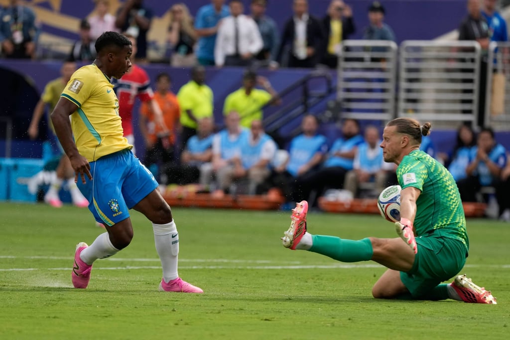 Norway goalkeeper Orjan Nyland saves an effort from Brazil’s Endrick during the game at MetLife Stadium. Photo: AP Norway goalkeeper Orjan Nyland saves an effort from Brazil’s Endrick during the game at MetLife Stadium. Photo: AP