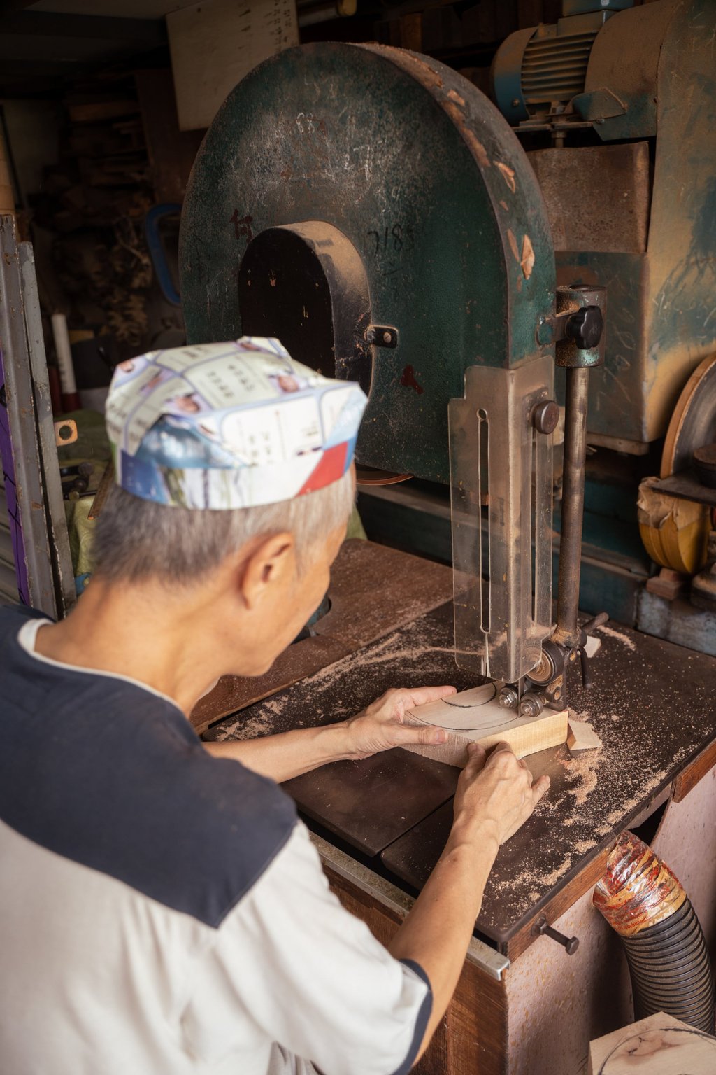 Ho at work in his sifu hat. Photo: Alexander Mak