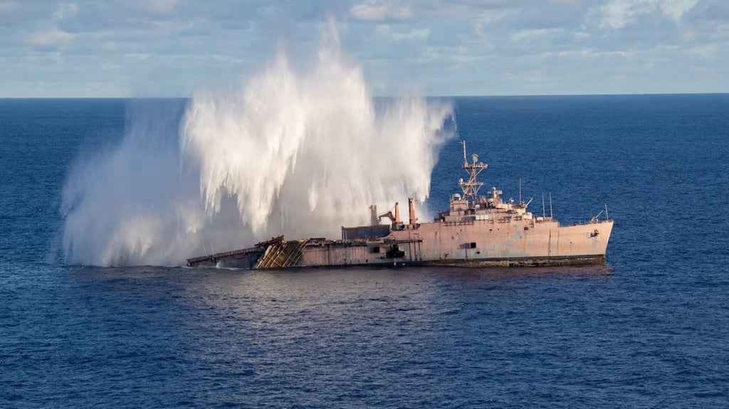 A Japanese submarine fires a torpedo at a decommissioned US warship during a live-fire exercise in the Philippine Sea last month. Photo: US Navy/TNS A Japanese submarine fires a torpedo at a decommissioned US warship during a live-fire exercise in the Philippine Sea last month. Photo: US Navy/TNS