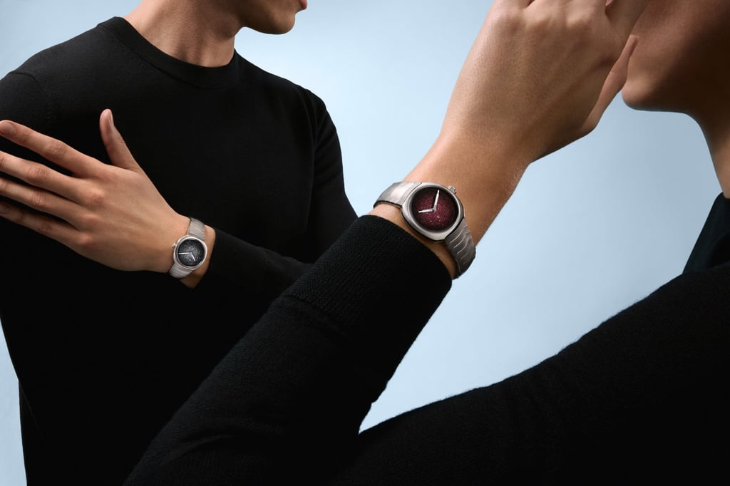 From left: H. Moser & Cie Streamliner Two Hands 34mm in steel with silver fumé dial and Streamliner Two Hands 28mm in steel with burgundy fumé dial. Photo: Handout From left: H. Moser & Cie Streamliner Two Hands 34mm in steel with silver fumé dial and Streamliner Two Hands 28mm in steel with burgundy fumé dial. Photo: Handout