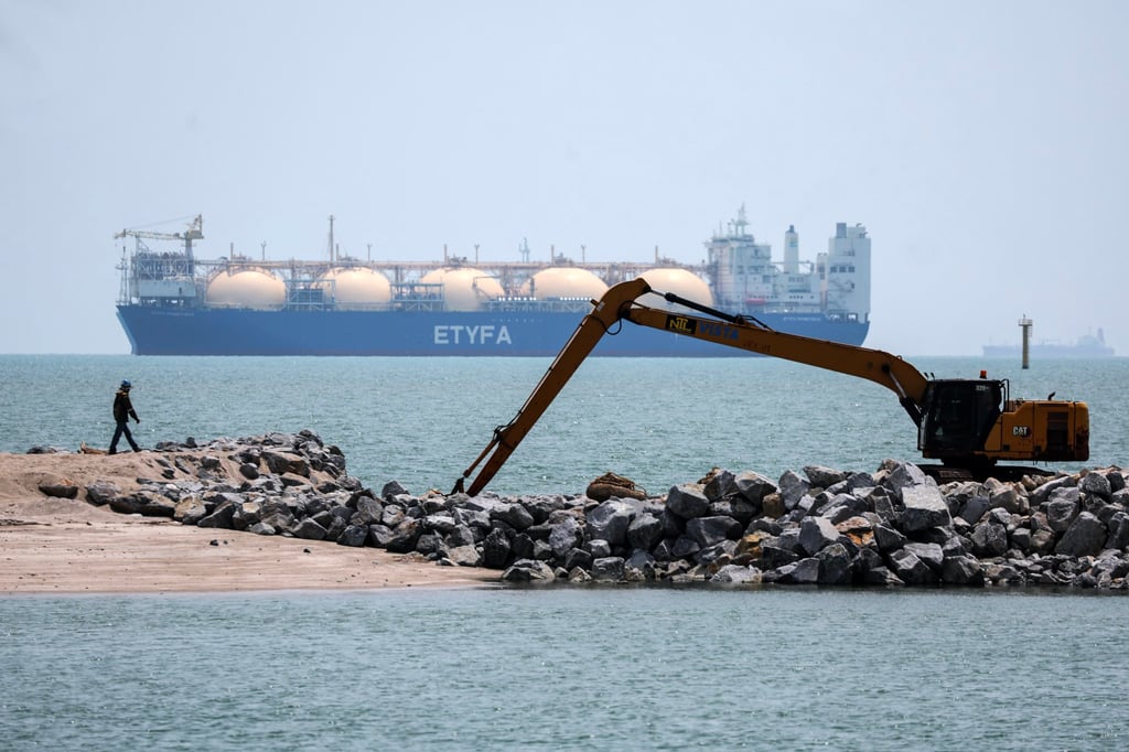A worker walks past the liquefied natural gas tanker ETYFA-Prometheas in the Malacca Strait in April. The Strait of Malacca is the world’s largest oil chokepoint in terms of transit volume. Photo: EPA A worker walks past the liquefied natural gas tanker ETYFA-Prometheas in the Malacca Strait in April. The Strait of Malacca is the world’s largest oil chokepoint in terms of transit volume. Photo: EPA