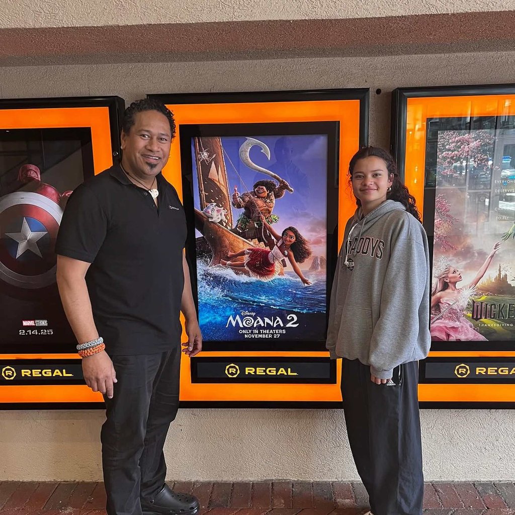 Catherine Laga’aia and her father pose in front of a poster for the animated film Moana at a theatre in Atlanta, Georgia, in September 2024. Photo: @jaylagaaia/Instagram Catherine Laga’aia and her father pose in front of a poster for the animated film Moana at a theatre in Atlanta, Georgia, in September 2024. Photo: @jaylagaaia/Instagram