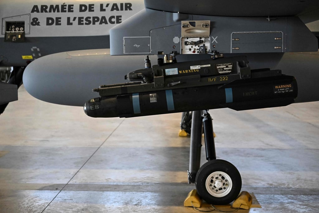 A model of a Hellfire missile attached under the wing of an MQ-9 Reaper military drone during a demonstration in Chateaubernard, France. Photo: AFP A model of a Hellfire missile attached under the wing of an MQ-9 Reaper military drone during a demonstration in Chateaubernard, France. Photo: AFP