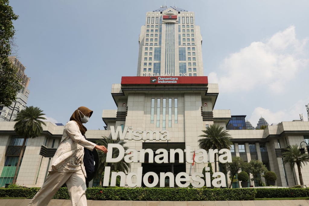 A woman walks past the logo of Indonesia’s sovereign wealth fund Danantara in Jakarta. Photo: Reuters A woman walks past the logo of Indonesia’s sovereign wealth fund Danantara in Jakarta. Photo: Reuters