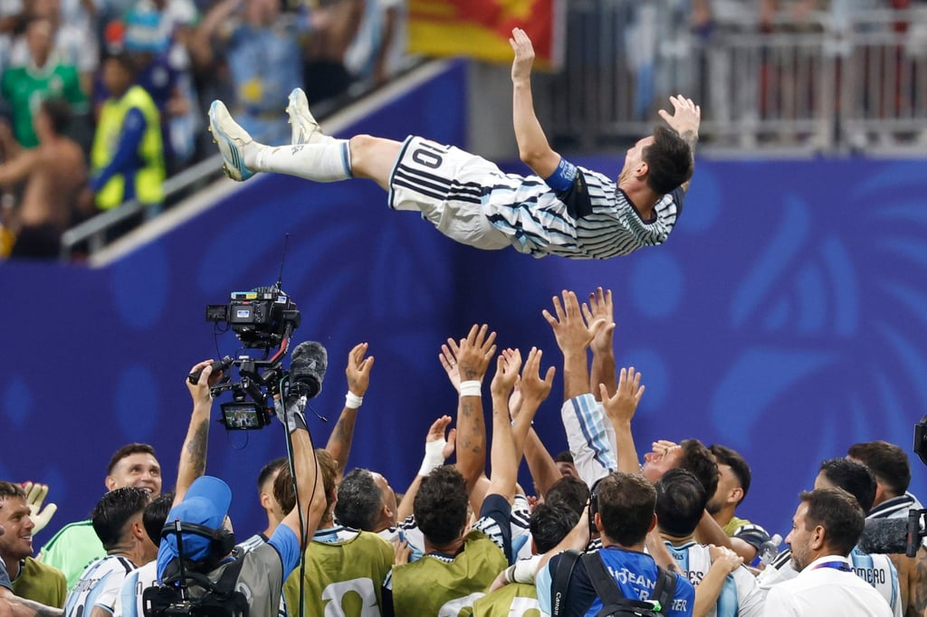 Lionel Messi is thrown into the air by his teammates after Argentina’s remarkable win over Egypt. Photo: AP Lionel Messi is thrown into the air by his teammates after Argentina’s remarkable win over Egypt. Photo: AP