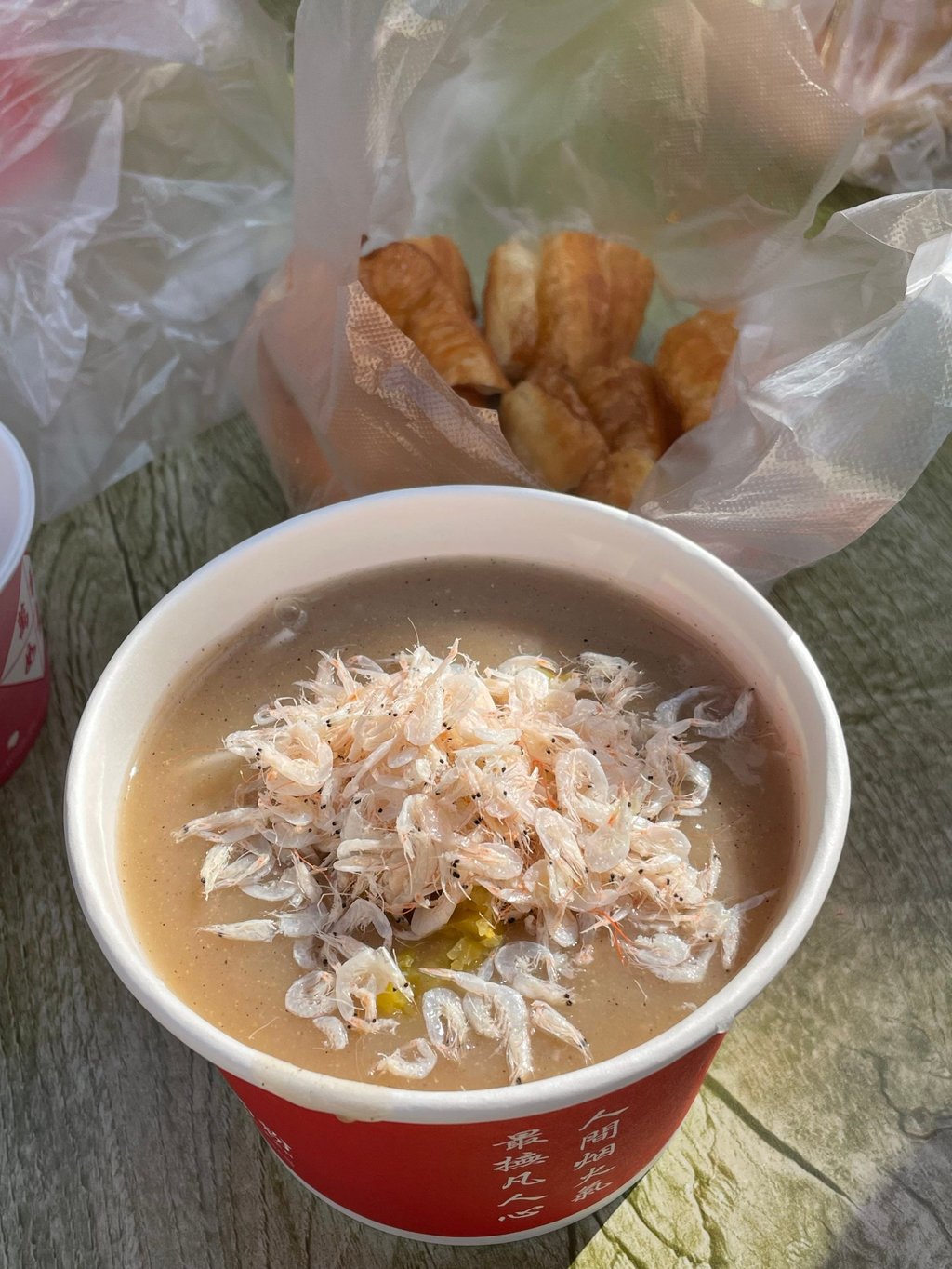 Yuhufen, a Wuhan breakfast dish consisting of thick peppery fish broth poured over thin rice noodles served with youtiao fried dough sticks, at speciality restaurant Wang Ji. Photo: Xiong Yang