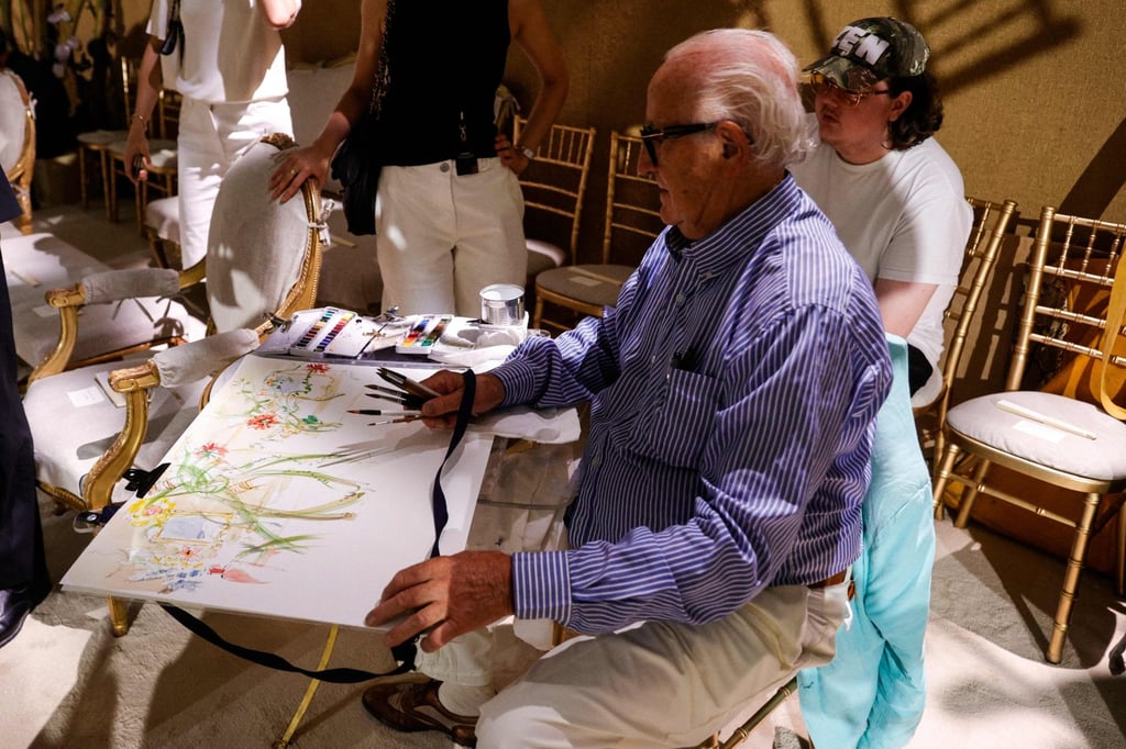 A watercolour artist on the set of the Chanel show. Photo: AFP A watercolour artist on the set of the Chanel show. Photo: AFP
