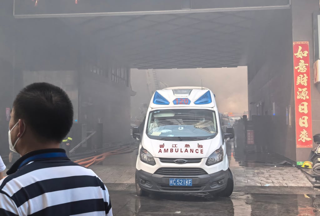 An ambulance is on standby at the footwear factory fire in Jinjiang on Thursday. Photo: Xinhua An ambulance is on standby at the footwear factory fire in Jinjiang on Thursday. Photo: Xinhua