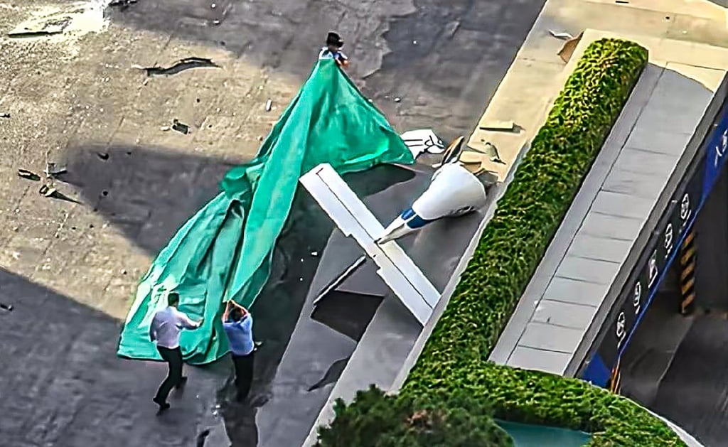Debris is seen after a light sport aircraft crashed into Beijing’s tallest skyscraper on June 26. Photo: handout Debris is seen after a light sport aircraft crashed into Beijing’s tallest skyscraper on June 26. Photo: handout