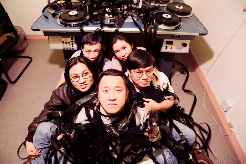The key people behind UFO, pictured in 1993: (clockwise from the front) Eric Tsang, Peter Chan, Jacob Cheung, Claudie Chung and Lee Chi-ngai. Photo: SCMP The key people behind UFO, pictured in 1993: (clockwise from the front) Eric Tsang, Peter Chan, Jacob Cheung, Claudie Chung and Lee Chi-ngai. Photo: SCMP