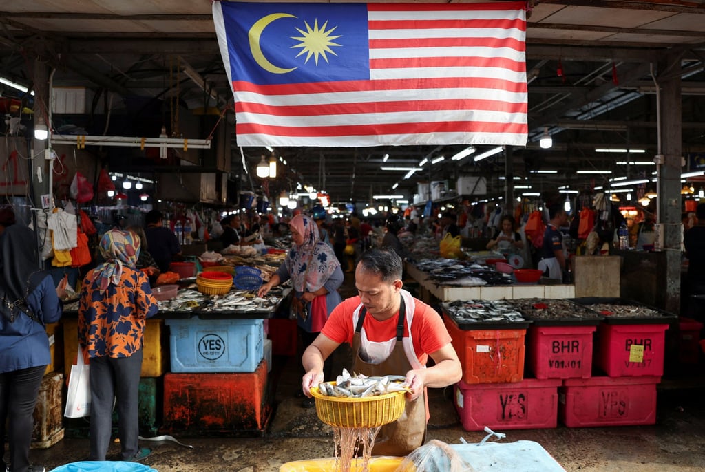 A fishmonger holds a basket of fish at a wet market in Kuala Lumpur, Malaysia. In May, Thailand restricted the import of Malaysian-caught sea bass due to concerns over chemical residues. Photo: Reuters A fishmonger holds a basket of fish at a wet market in Kuala Lumpur, Malaysia. In May, Thailand restricted the import of Malaysian-caught sea bass due to concerns over chemical residues. Photo: Reuters