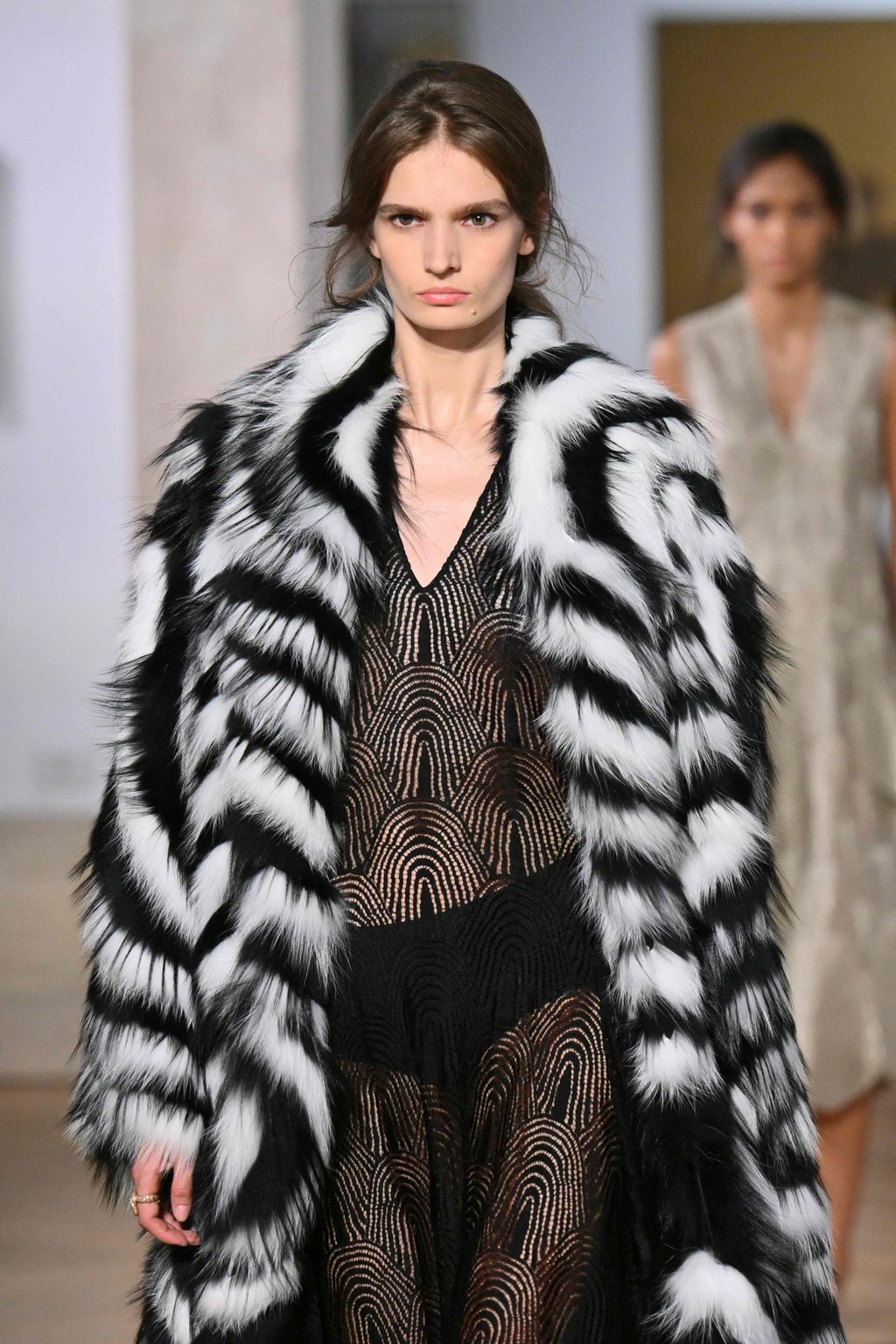 A fur coat worn over a sheer dress at Fendi’s fall/winter 2026-27 haute couture show in Rome. Photo: AFP A fur coat worn over a sheer dress at Fendi’s fall/winter 2026-27 haute couture show in Rome. Photo: AFP
