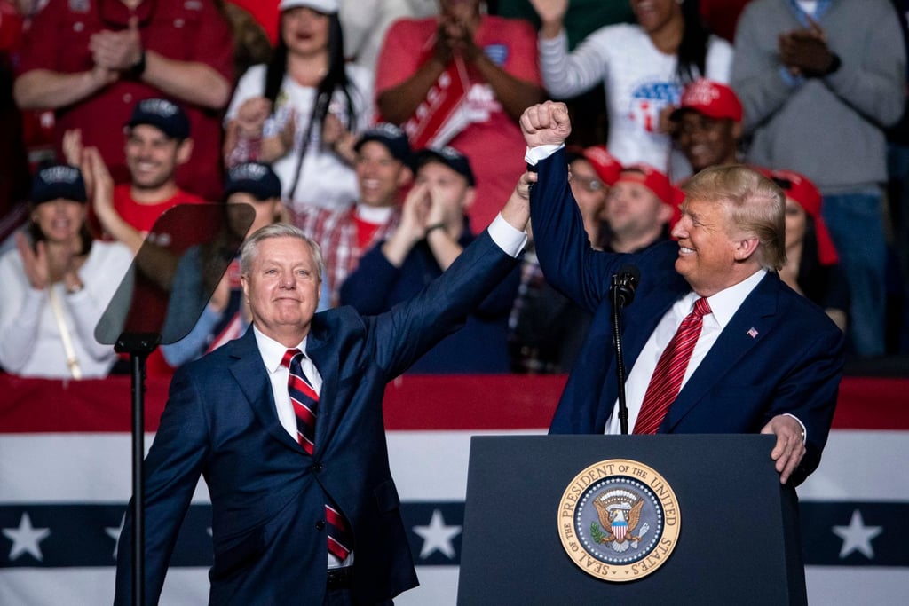 US President Donald Trump (right) greets Lindsey Graham during a campaign rally in North Charleston, South Carolina, in 2020. Photo: EPA US President Donald Trump (right) greets Lindsey Graham during a campaign rally in North Charleston, South Carolina, in 2020. Photo: EPA