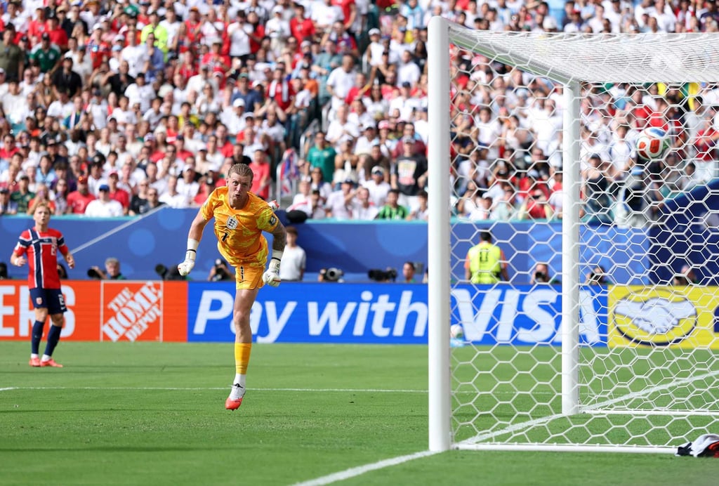 Andreas Schjelderup’s first-half strike drifts beyond Jordan Pickford in the England goal. Photo: AFP