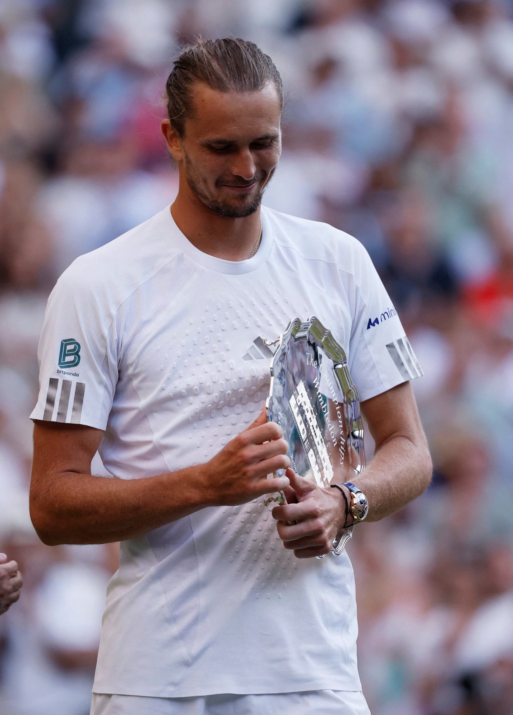 Germany’s Alexander Zverev with the runner-up trophy after his final match against Sinner at Wimbledon on Sunday. Photo: Reuters Germany’s Alexander Zverev with the runner-up trophy after his final match against Sinner at Wimbledon on Sunday. Photo: Reuters