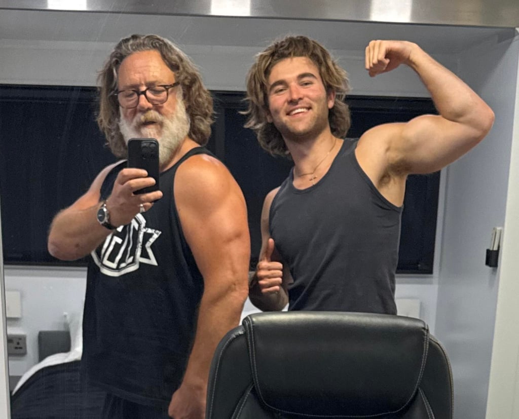Russell Crowe and his son, Tennyson Spencer Crowe, flex their muscles in a mirror selfie. Photo: @russellcrowe/X Russell Crowe and his son, Tennyson Spencer Crowe, flex their muscles in a mirror selfie. Photo: @russellcrowe/X