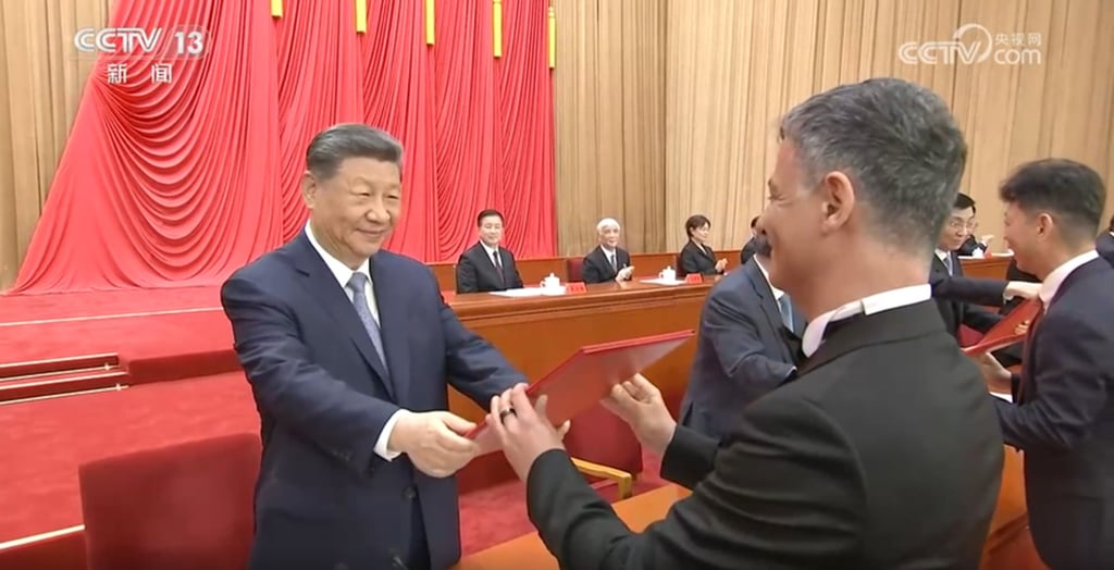 Artem Oganov receives the International Science and Technology Cooperation Award from Chinese President Xi Jinping in Beijing on July 8. Photo: CCTV Artem Oganov receives the International Science and Technology Cooperation Award from Chinese President Xi Jinping in Beijing on July 8. Photo: CCTV