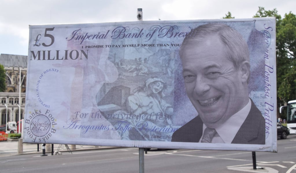 A mock £5 million note with a picture of Nigel Farage is displayed during the weekly anti-Brexit protest in the Commons on Wednesday. Photo: dpa