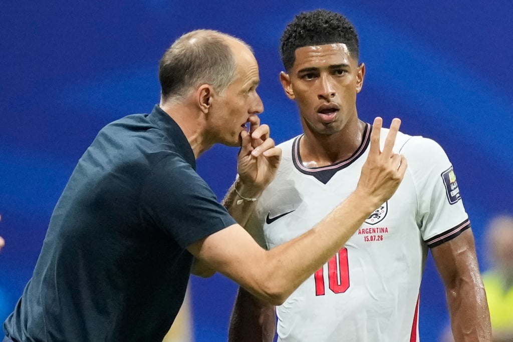 England head coach, Thomas Tuchel (left) giving instructions to Jude Bellingham. Photo: AP