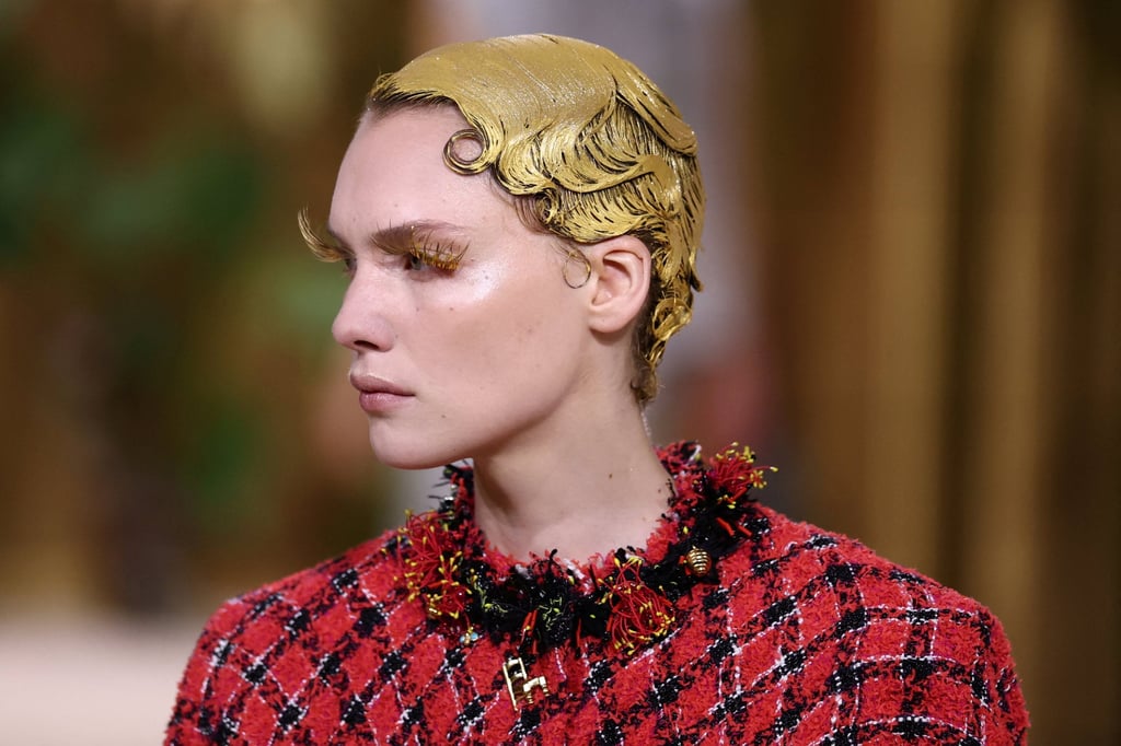 A model with gold-painted hair at Matthieu Blazy’s fall/winter 2026 haute couture show for Chanel in Paris, on July 7. Photo: Reuters A model with gold-painted hair at Matthieu Blazy’s fall/winter 2026 haute couture show for Chanel in Paris, on July 7. Photo: Reuters