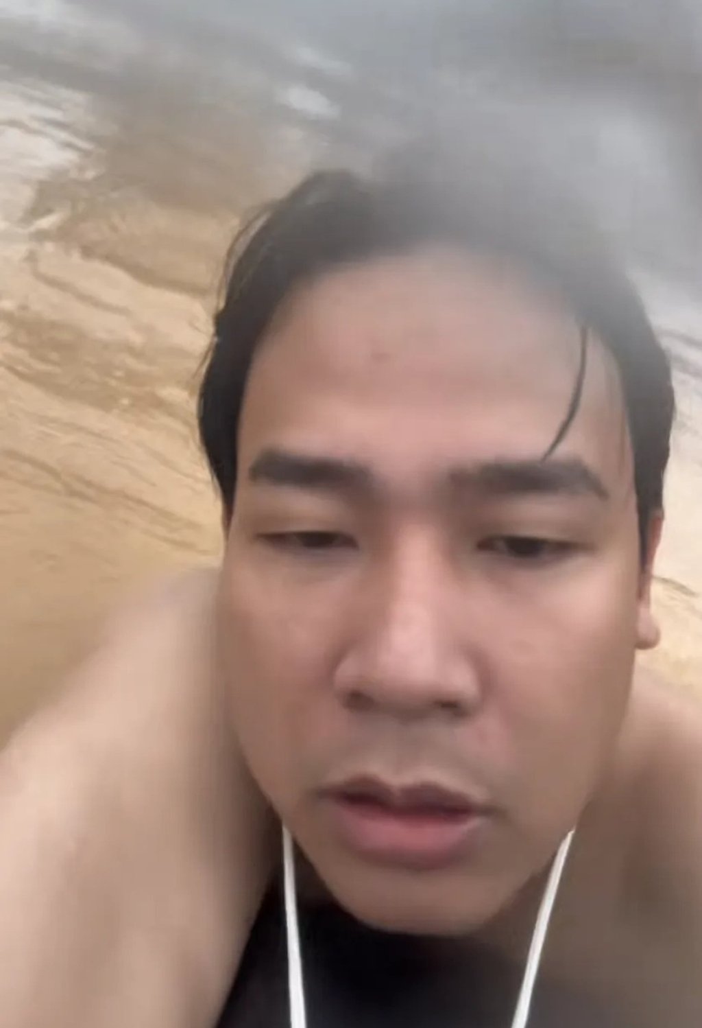 Despite being a strong swimmer, battling the turbulent floodwaters for three hours proved deeply exhausting for Xie. Photo: Handout Despite being a strong swimmer, battling the turbulent floodwaters for three hours proved deeply exhausting for Xie. Photo: Handout