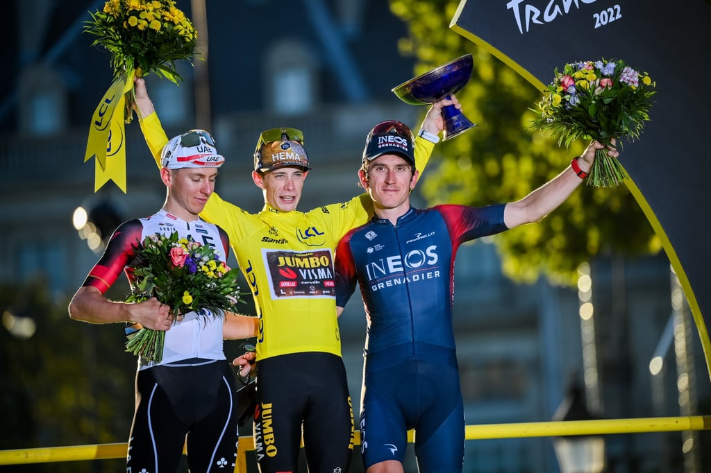 Tadej Pogacar (left) and Geraint Thomas (right) on the podium with Jonas Vingegaard, who won 2022 Tour de France. Photo: dpa Tadej Pogacar (left) and Geraint Thomas (right) on the podium with Jonas Vingegaard, who won 2022 Tour de France. Photo: dpa
