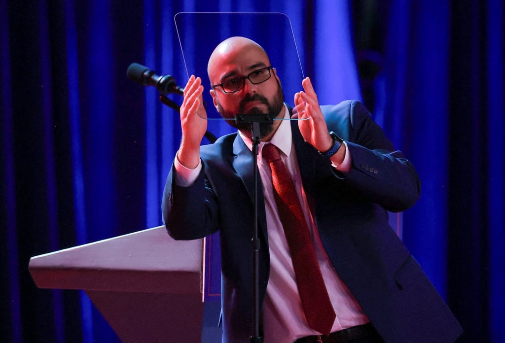 Gabriel Perez checks a teleprompter before Donald Trump arrives to speak in West Palm Beach, Florida, in November 2024. Photo: Reuters Gabriel Perez checks a teleprompter before Donald Trump arrives to speak in West Palm Beach, Florida, in November 2024. Photo: Reuters