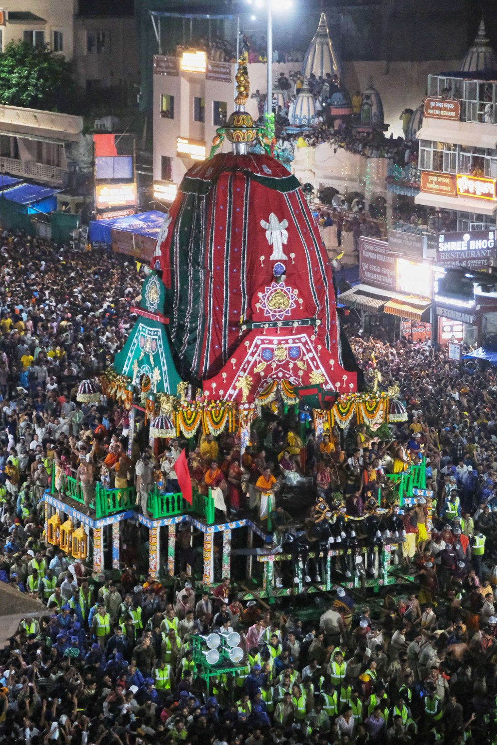 Hindu devotees surround the chariot of Lord Jagannath during the annual chariot procession, in Puri, India, on Thursday. Photo: AP Hindu devotees surround the chariot of Lord Jagannath during the annual chariot procession, in Puri, India, on Thursday. Photo: AP