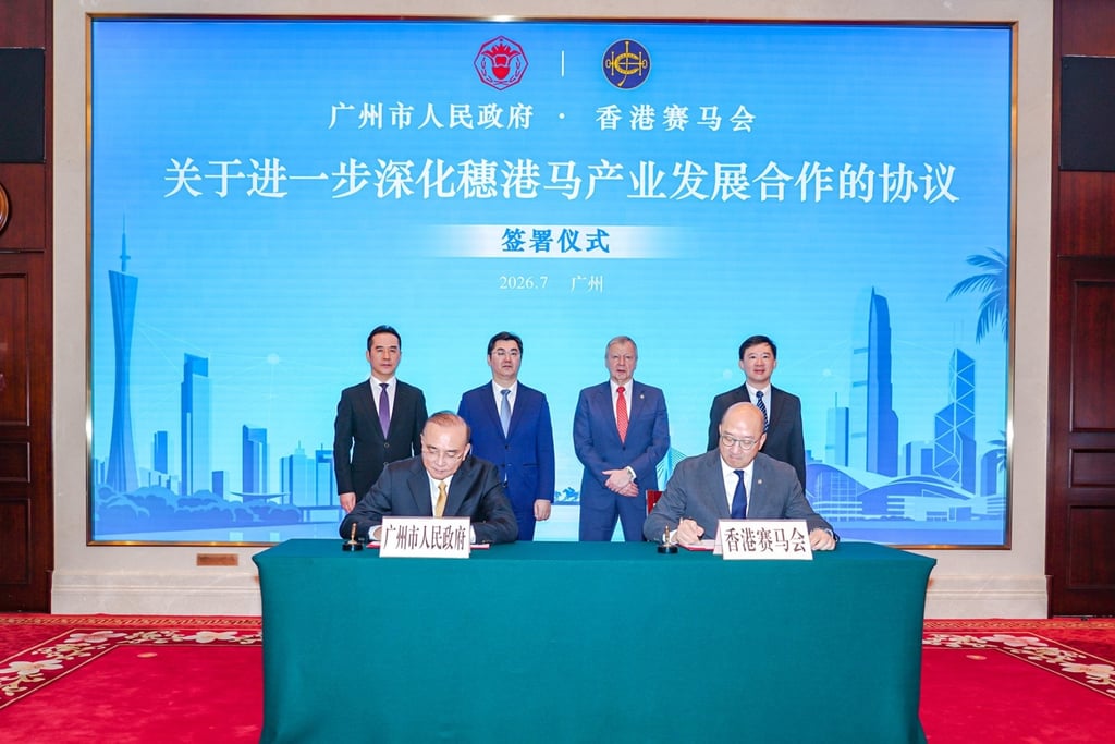Pan Zhijun, Secretary General of the Guangzhou Municipal People’s Government (left); and Raymond Tam, the Jockey Club’s executive director, corporate affairs, sign the agreement. Photo: HKJC Pan Zhijun, Secretary General of the Guangzhou Municipal People’s Government (left); and Raymond Tam, the Jockey Club’s executive director, corporate affairs, sign the agreement. Photo: HKJC