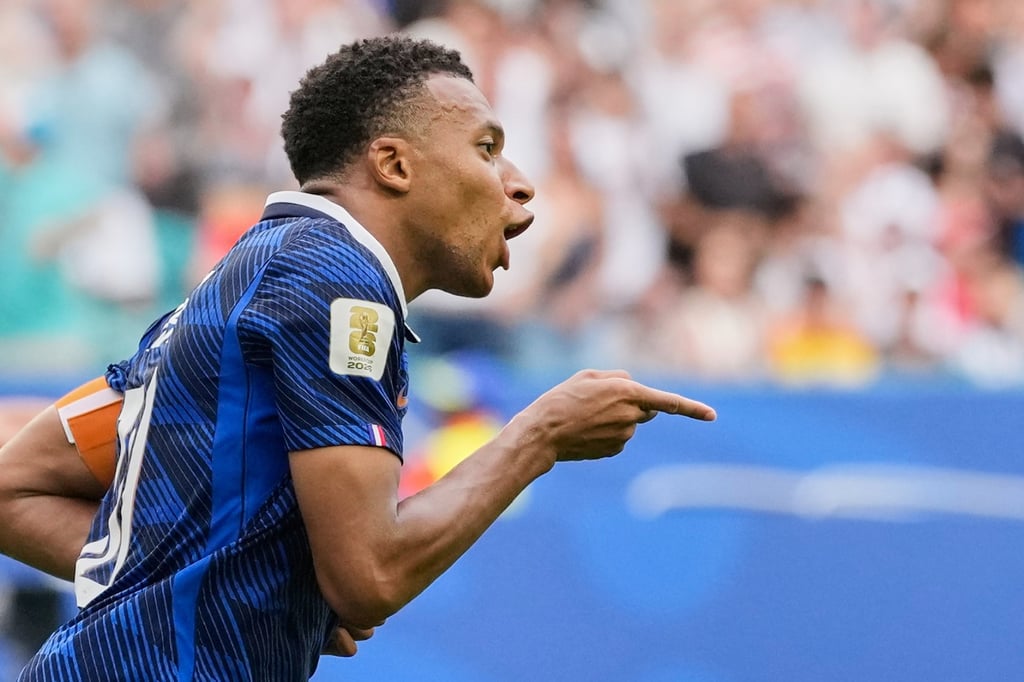 France’s Kylian Mbappe celebrates scoring his side’s third. Photo: AP France’s Kylian Mbappe celebrates scoring his side’s third. Photo: AP
