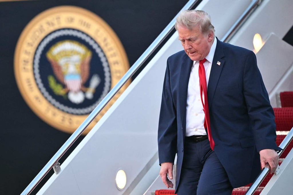 US President Donald Trump steps off Air Force One upon arrival at Joint Base Andrews on Sunday. Photo: AFP US President Donald Trump steps off Air Force One upon arrival at Joint Base Andrews on Sunday. Photo: AFP