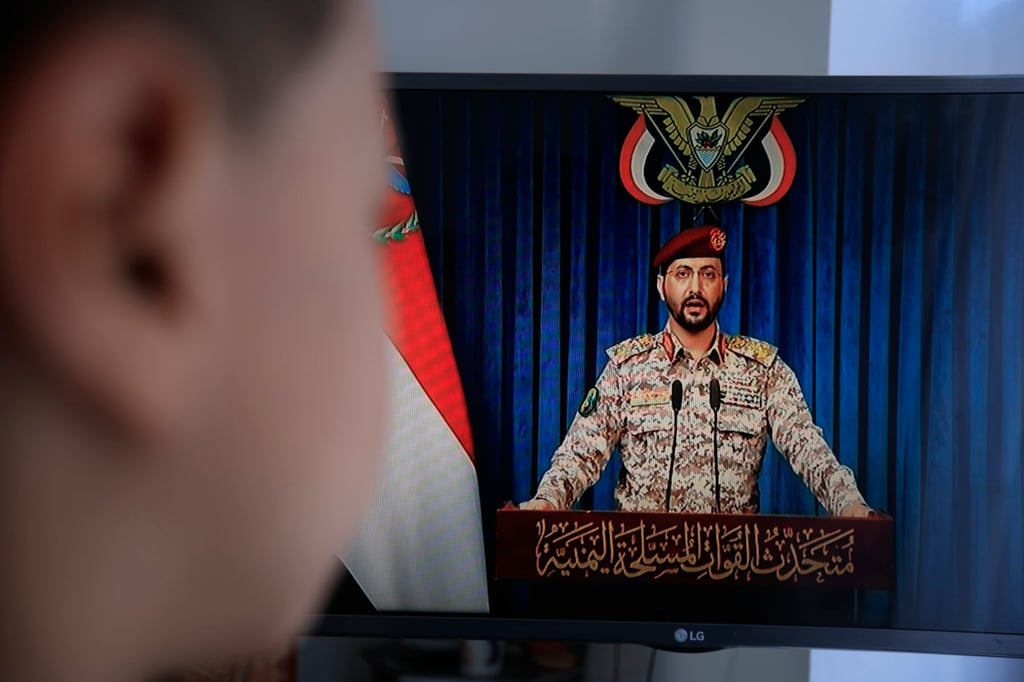 A person watches Houthi military spokesman Yahya Sarea deliver a televised statement in Sana’a, Yemen, on Monday. Photo EPA A person watches Houthi military spokesman Yahya Sarea deliver a televised statement in Sana’a, Yemen, on Monday. Photo EPA