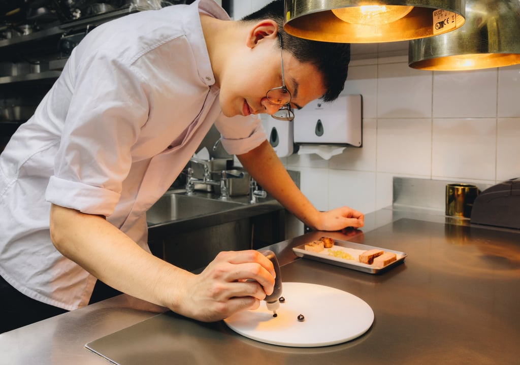 Keith Teo making the Iberico pork three-ways at Whey. Photo: Jocelyn Tam