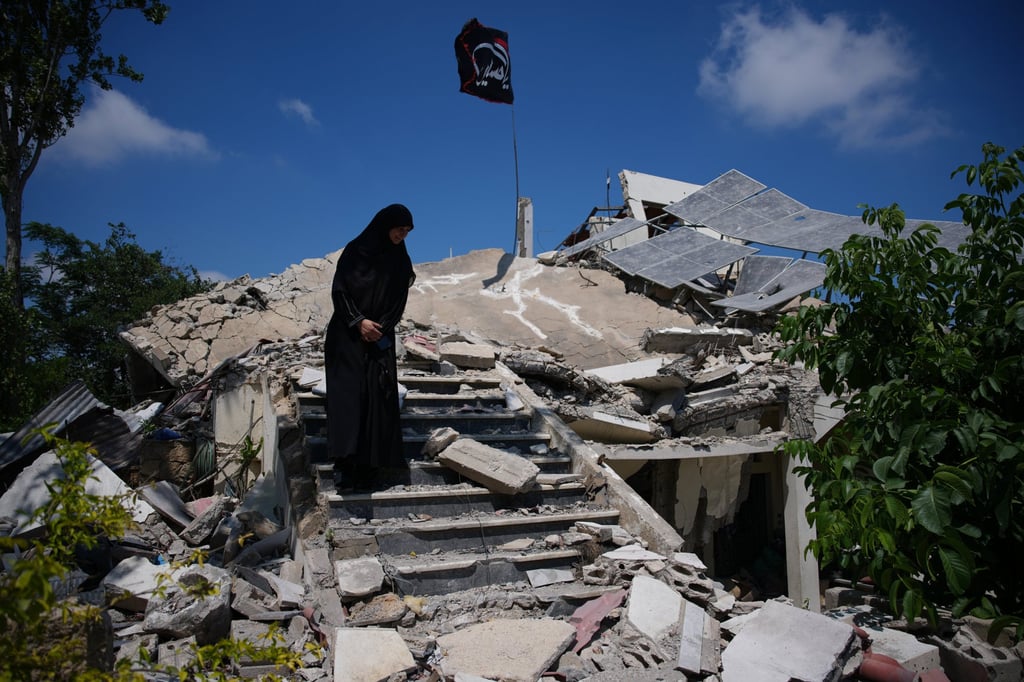 Fatima Mokdad stands amid the rubble of her home on Tuesday, after it was destroyed in an Israeli air strike in Froun village, southern Lebanon. Photo: AP Fatima Mokdad stands amid the rubble of her home on Tuesday, after it was destroyed in an Israeli air strike in Froun village, southern Lebanon. Photo: AP
