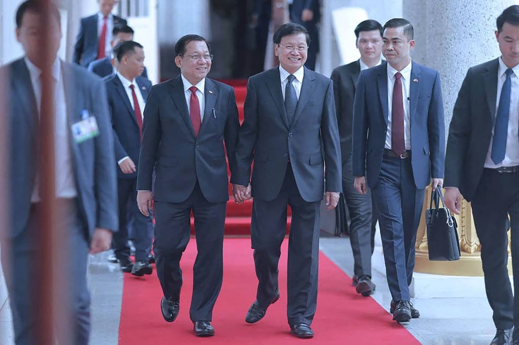 Myanmar’s President Min Aung Hlaing (left) walks with Lao President Thongloun Sisoulith after a memorandum of understanding signing in Vientiane on July 3. Photo: Myanmar’s Presidential Press and Information Bureau/AFP Myanmar’s President Min Aung Hlaing (left) walks with Lao President Thongloun Sisoulith after a memorandum of understanding signing in Vientiane on July 3. Photo: Myanmar’s Presidential Press and Information Bureau/AFP