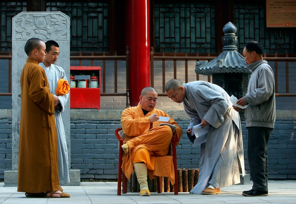 Training at a Shaolin school involves acrobatics, kicks, punches and power stretching. Photo: Getty Images