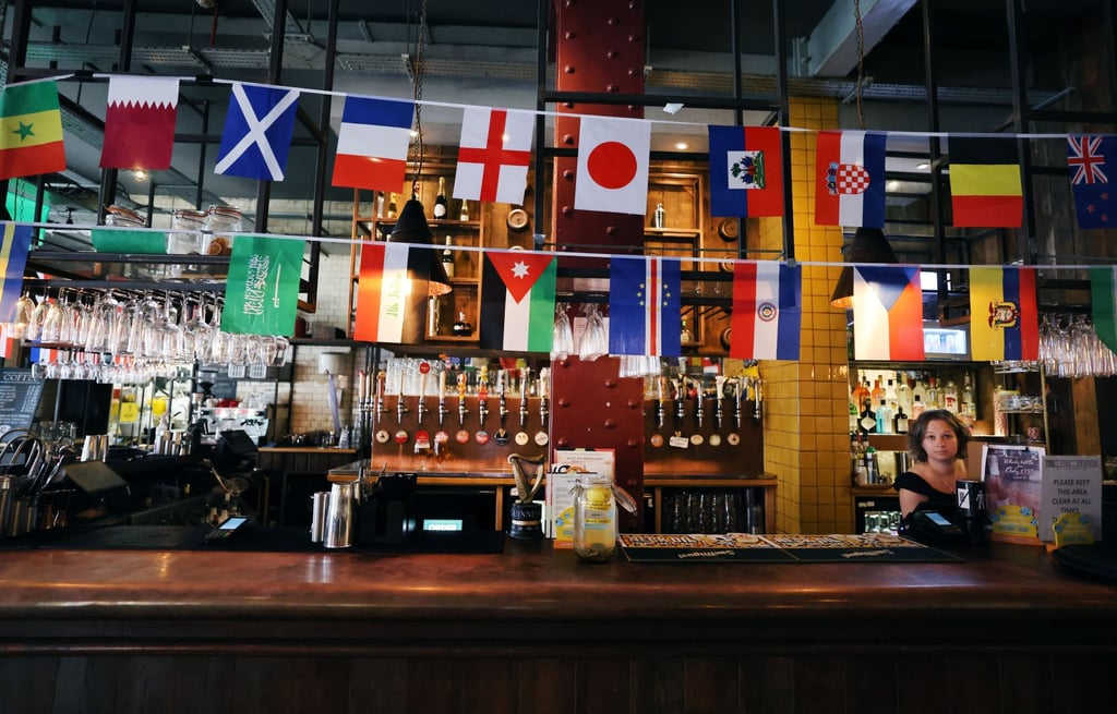 A pub in London features bunting for the Fifa World Cup in July. Photo: EPA A pub in London features bunting for the Fifa World Cup in July. Photo: EPA